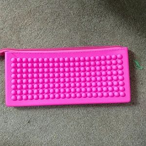 A pink pencil pouch